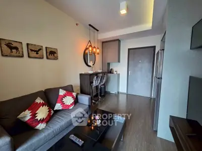 Modern living room with stylish decor and open kitchen layout