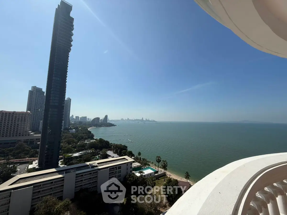 Stunning ocean view from high-rise balcony in luxury urban setting