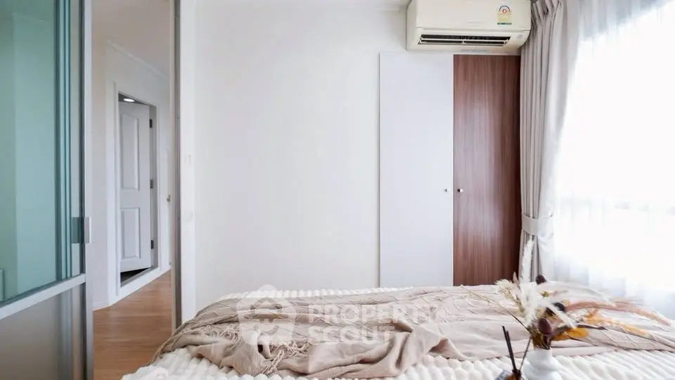 Bright and cozy bedroom with modern decor and natural light