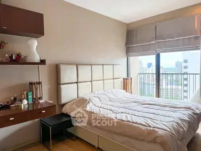 Spacious bedroom with city view and modern decor in high-rise apartment
