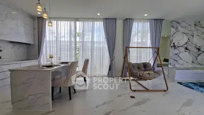 Luxurious modern living room with marble flooring, elegant dining area, and cozy swing chair.