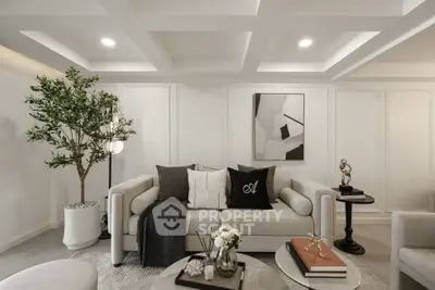 Elegant living room with modern decor and cozy seating area