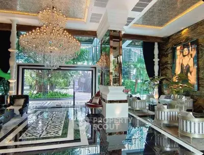 Luxurious living room with chandeliers and elegant decor in a modern home