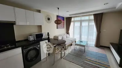 Modern living room with washing machine and stylish decor