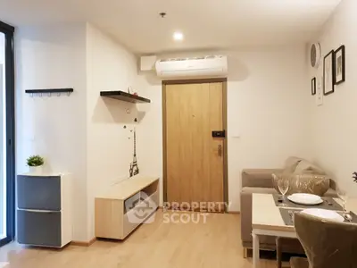 Modern living room with stylish decor and cozy dining area