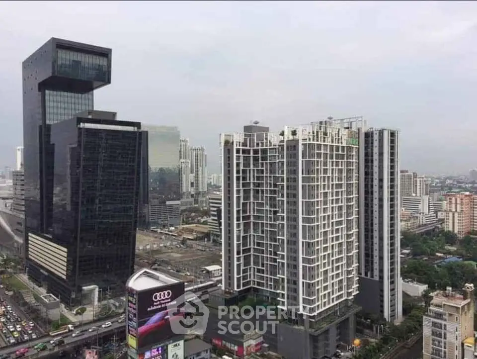 Stunning cityscape view featuring modern high-rise buildings in a bustling urban environment.