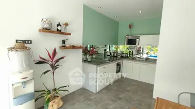 Modern kitchen with sleek design, featuring open layout and stylish decor, perfect for contemporary living.