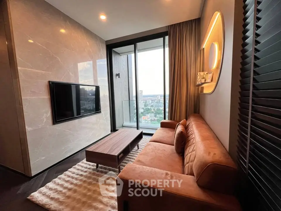 Luxurious living room with modern decor and stunning city view from balcony.