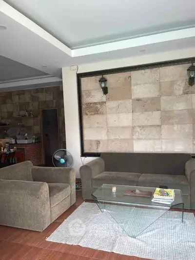 Spacious living room with modern furniture and stylish decor