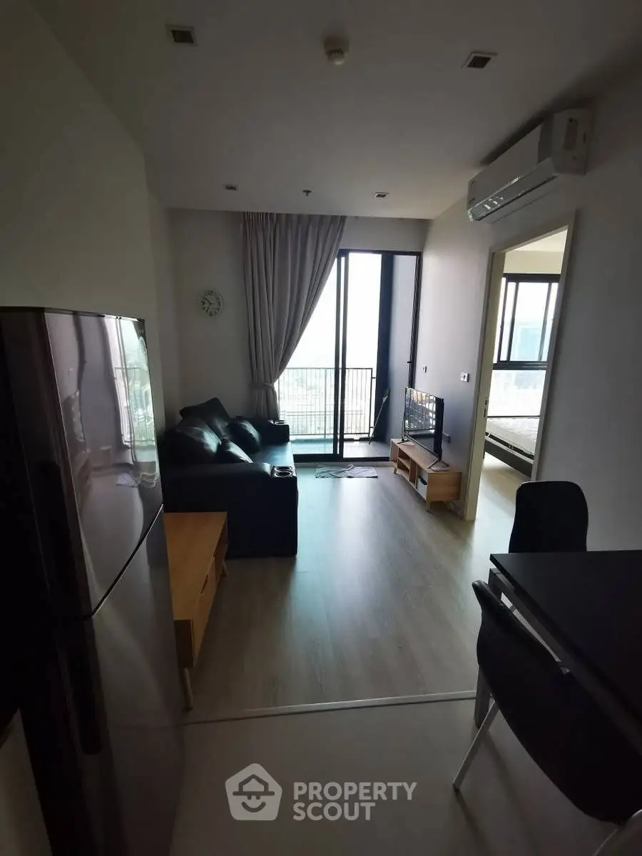 Modern living room with balcony view in stylish apartment