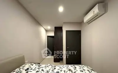Modern bedroom with air conditioning and stylish decor