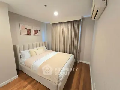 Cozy modern bedroom with elegant decor and natural light