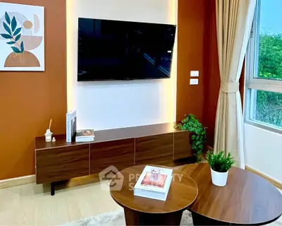 Stylish living room with modern TV setup and elegant decor