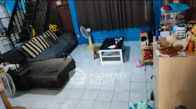 Cozy living room with modern furniture and vibrant decor, perfect for relaxation and entertainment.