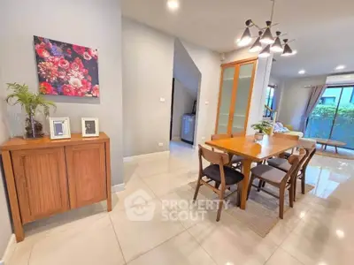 Spacious modern dining area with elegant lighting and stylish decor