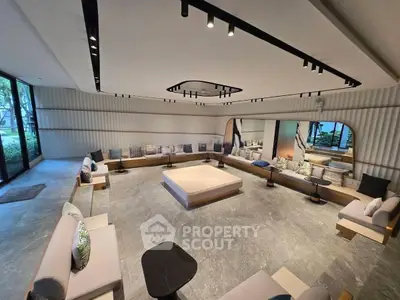 Luxurious modern living room with elegant seating and stylish decor