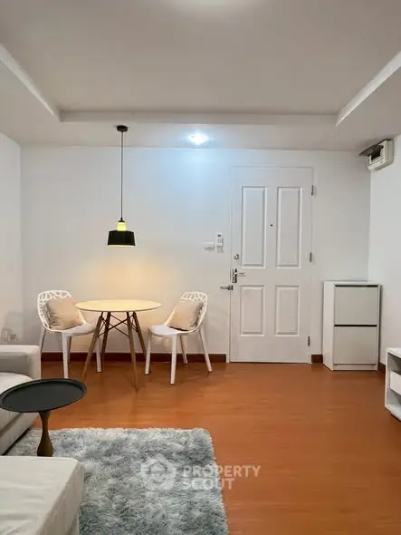 Modern living room with cozy seating and stylish decor