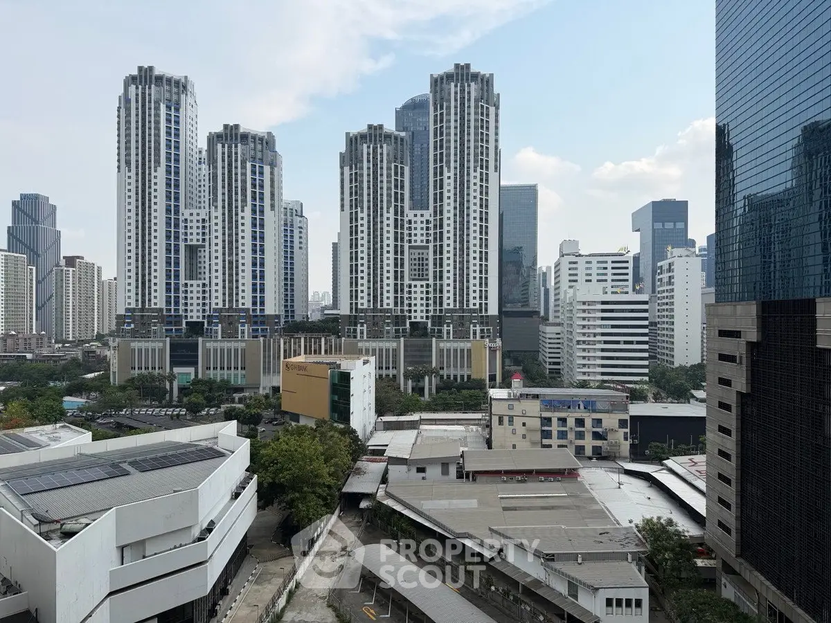Stunning cityscape view of modern high-rise buildings in an urban skyline, showcasing architectural elegance.