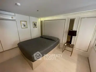 Modern bedroom with elegant decor and stylish lighting