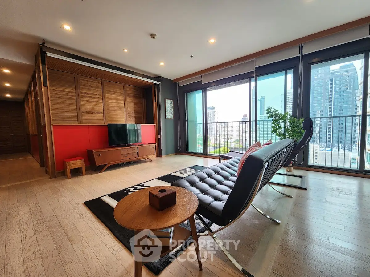 Spacious modern living room with city view and stylish furniture