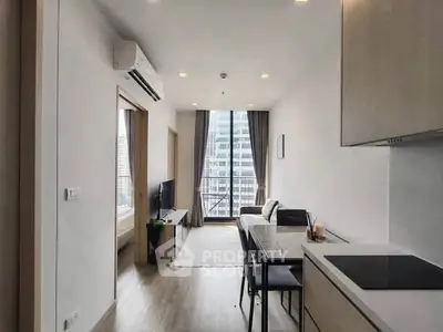 Modern living room with balcony view in high-rise apartment