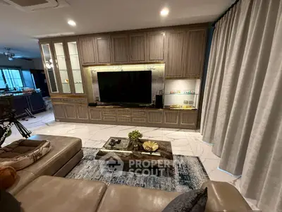 Luxurious living room with elegant built-in cabinetry and modern decor