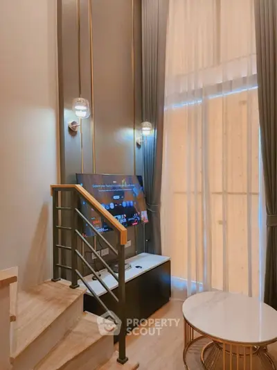 Modern living room with high ceilings and elegant decor