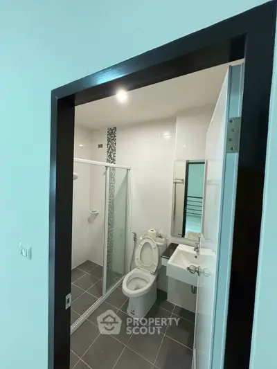 Modern bathroom with glass shower and sleek design