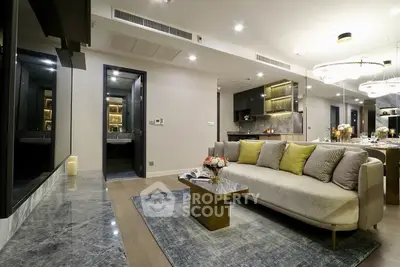 Luxurious modern living room with elegant decor and open kitchen layout