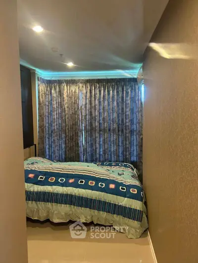 Cozy bedroom with modern decor and stylish curtains