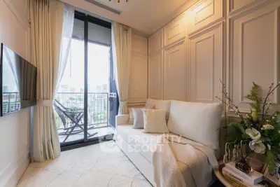 Elegant living room with balcony view and cozy sofa in modern apartment