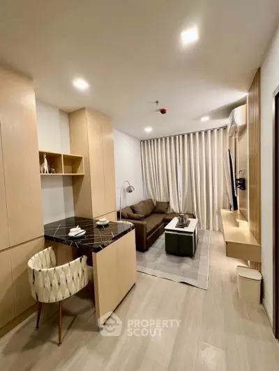 Modern living room with stylish furniture and open layout, perfect for urban living.