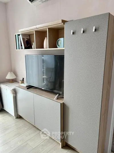 Modern living room with sleek TV unit and stylish decor