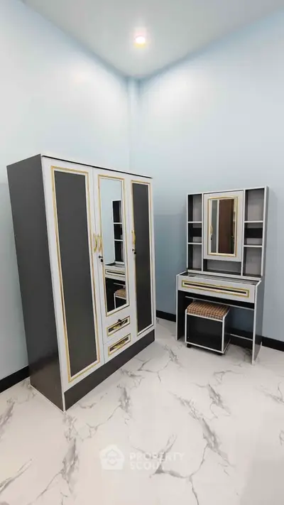 Stylish bedroom with modern wardrobe and vanity set in elegant design.