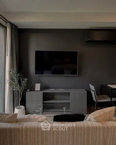 Modern living room with sleek TV setup and stylish decor