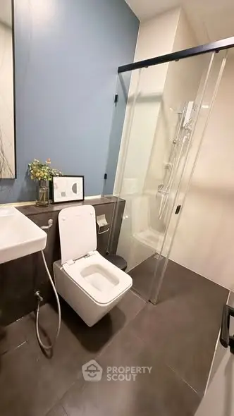 Modern bathroom with sleek design and glass shower enclosure