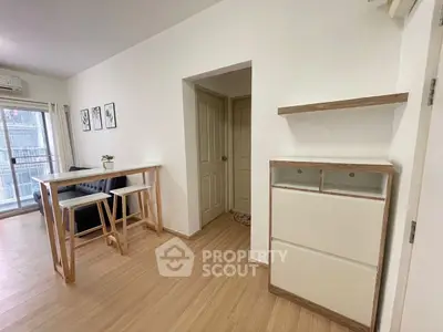 Modern apartment interior with wooden flooring and stylish furniture