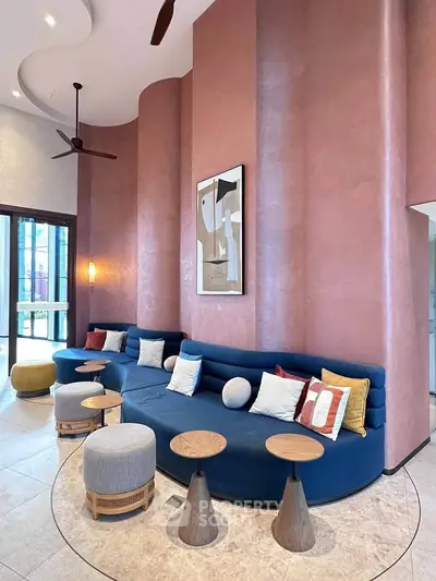 Luxurious modern living room with stylish blue sofa and elegant decor