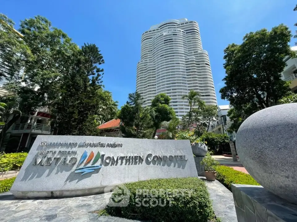 Stunning high-rise condo with lush gardens and modern architecture