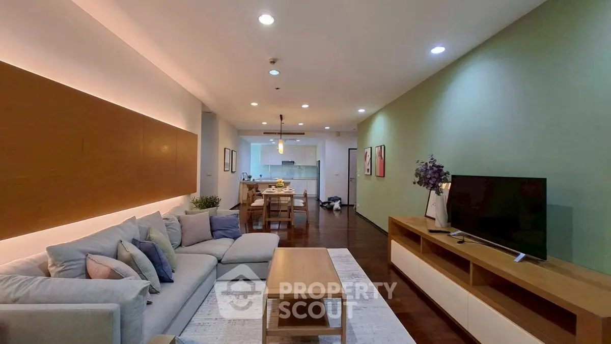 Spacious modern living room with stylish decor and open layout, perfect for relaxation and entertainment.
