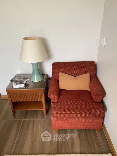 Cozy reading nook with armchair and side table in modern living room