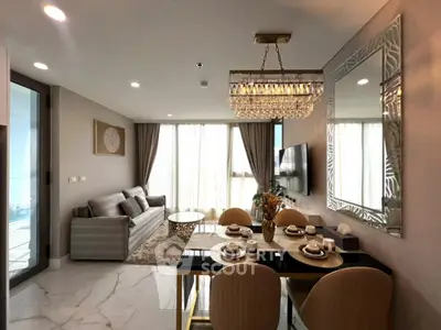 Luxurious modern living room with elegant dining area and stylish decor