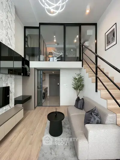 Modern duplex living room with stylish decor and mezzanine level