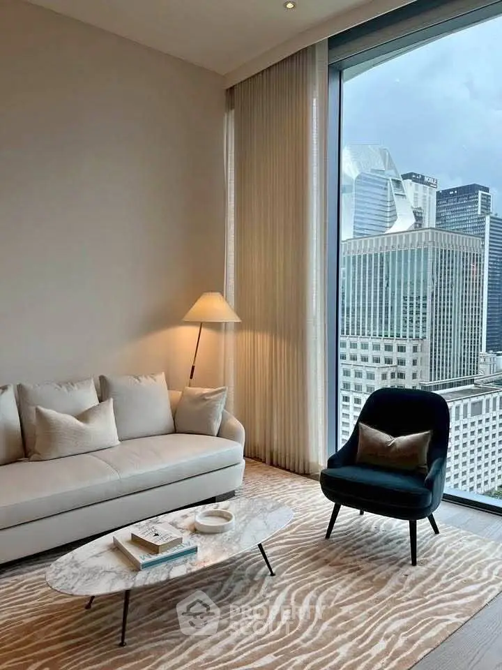 Luxurious living room with stunning city view, elegant furniture, and floor-to-ceiling windows.