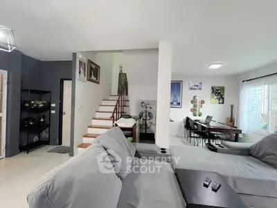 Spacious modern living room with stylish decor and cozy seating area