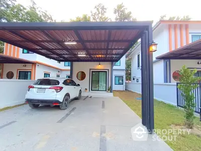 Modern two-story house with carport and stylish facade