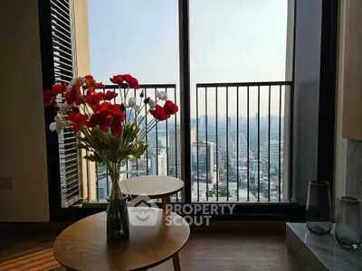 Stunning city view from modern apartment balcony with elegant decor