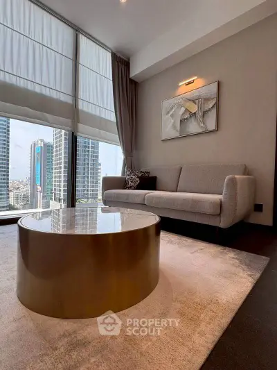 Luxurious living room with modern sofa and stunning city view through large windows.