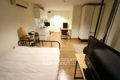 Modern studio apartment with open layout and stylish furnishings
