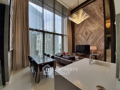 Luxurious open-plan living space with high-end finishes, floor-to-ceiling windows offering city views, and elegant furnishings.